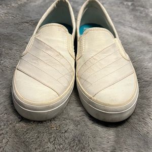 Sperry slip on shoes.